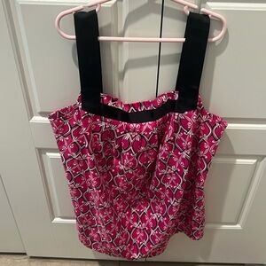 Cute woman’s tank like top. Pink with black and white throughout. Small